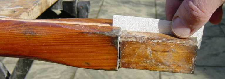 Photo showing cleaning the widened split with sandpaper