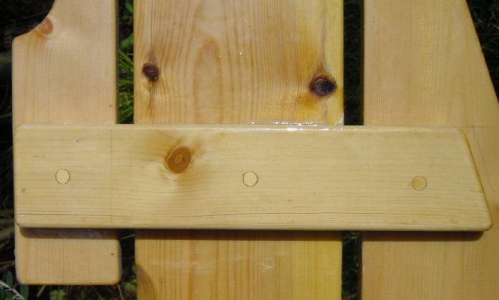 Detail of boards after sanding the plugs and overall varnishing