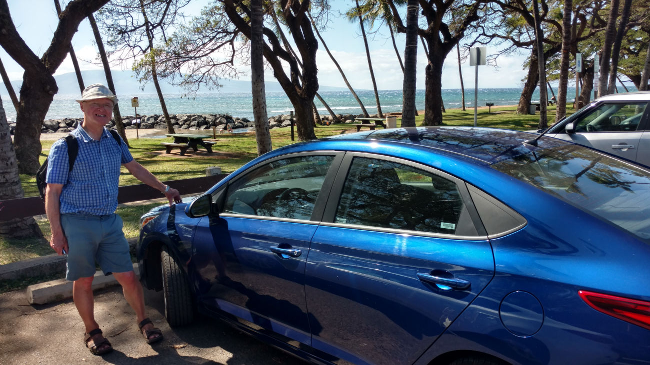 Tim with Hyundai hire car at Launiupoko Beach Park, Maui.
