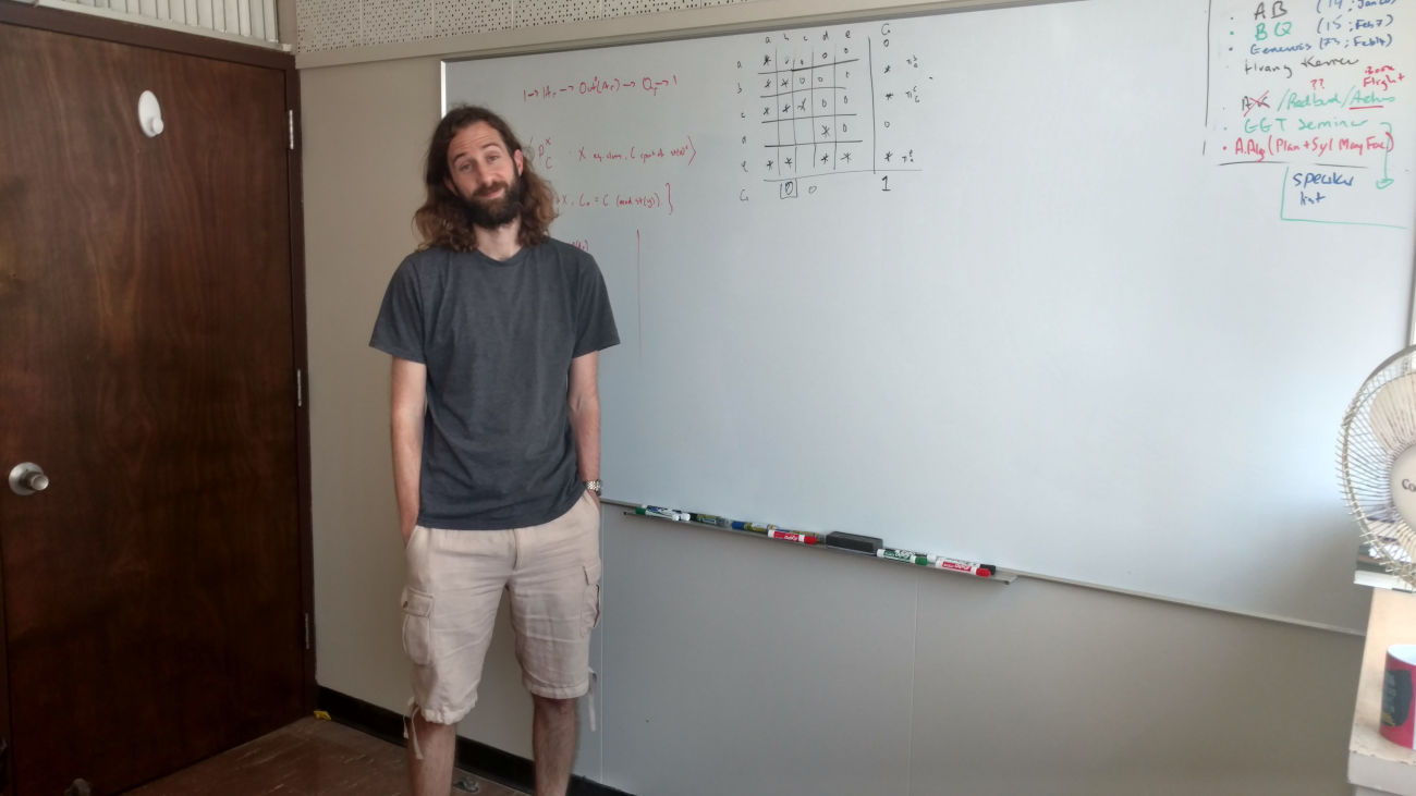 Andrew at white board in his office in the Math Dept of the University of Hawaii.