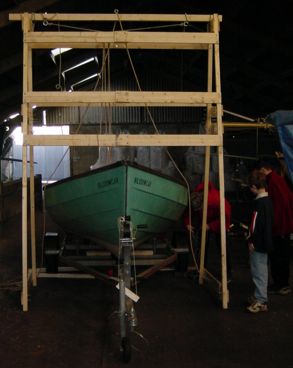 Photo of righted hoisting frame with Lugger underneath