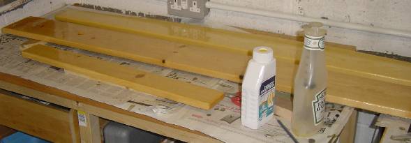 Photo of boards laid out for coating with epoxy
