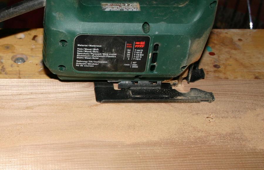 Cutting the wood with a jig saw