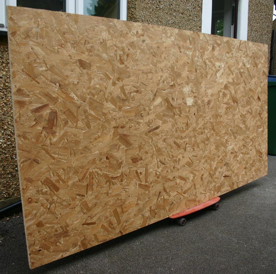 Moving a sheet of OSB using a skateboard, 13th August 2015.