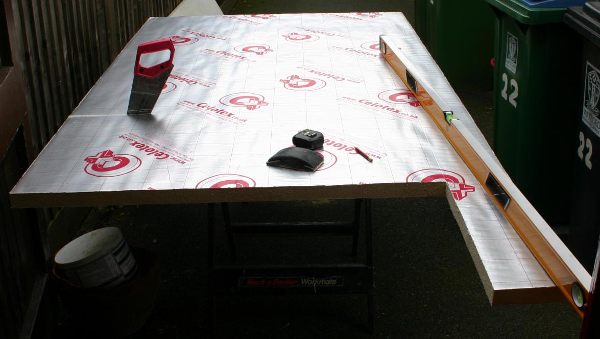 Marking out & cutting insulation board to size, 30th August 2015.