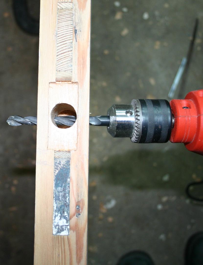Drilling the hole for the spindle.