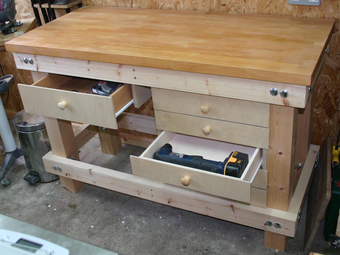 Photograph of completed workbench, drawers in use.