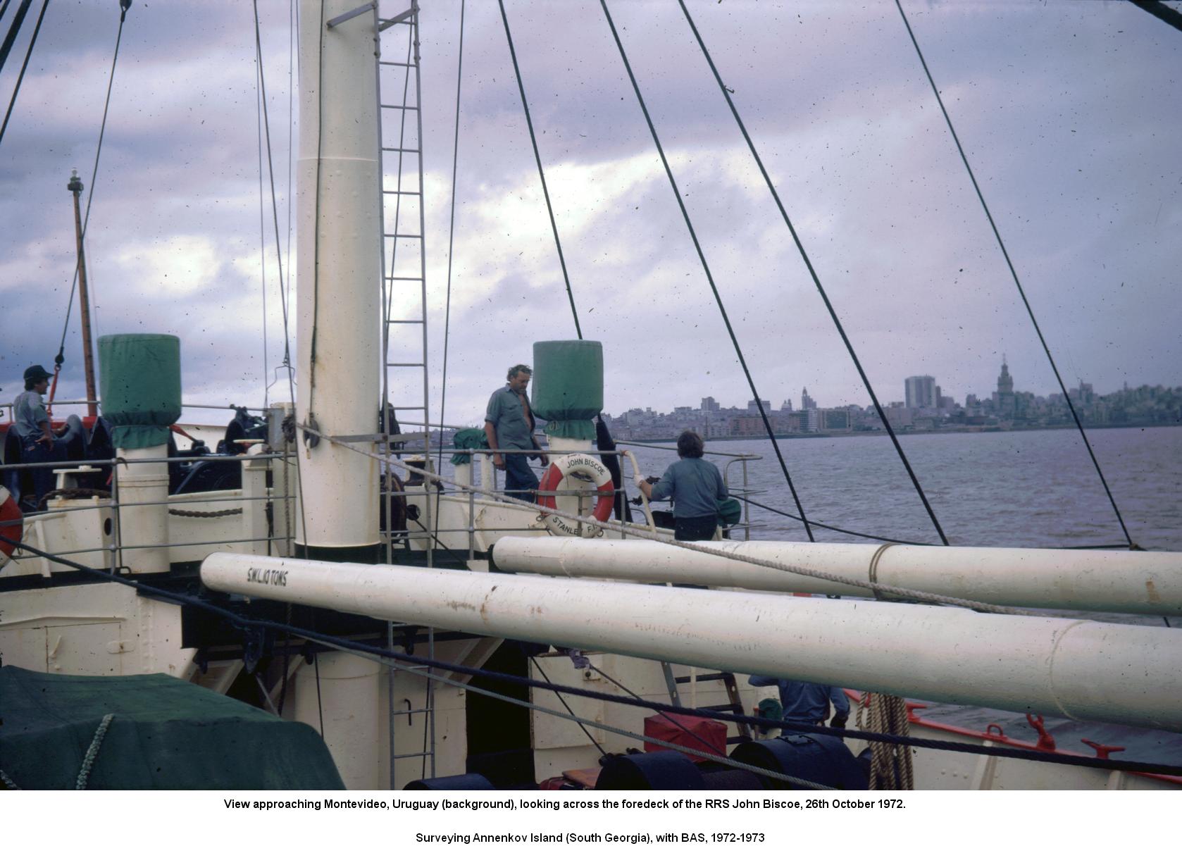 View of Montevideo (background), looking across the the foredeck of the RRS John Biscoe, 26th October 1972.