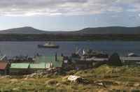 View across Stanley Harbour, Falkland Islands, showing the RRS John Biscoe and the SS Darwin. 4th November 1972.