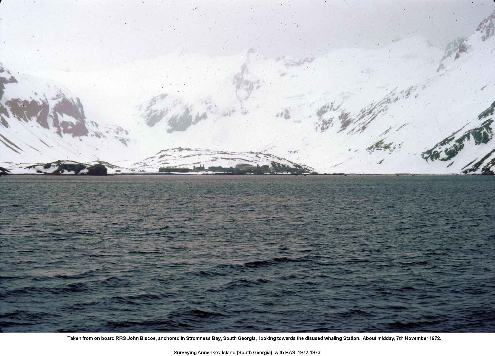 Taken from on board RRS John Biscoe, anchored in Stromness Bay, South Georgia, looking towards the disused whaling Station.  About midday, 7th November 1972.