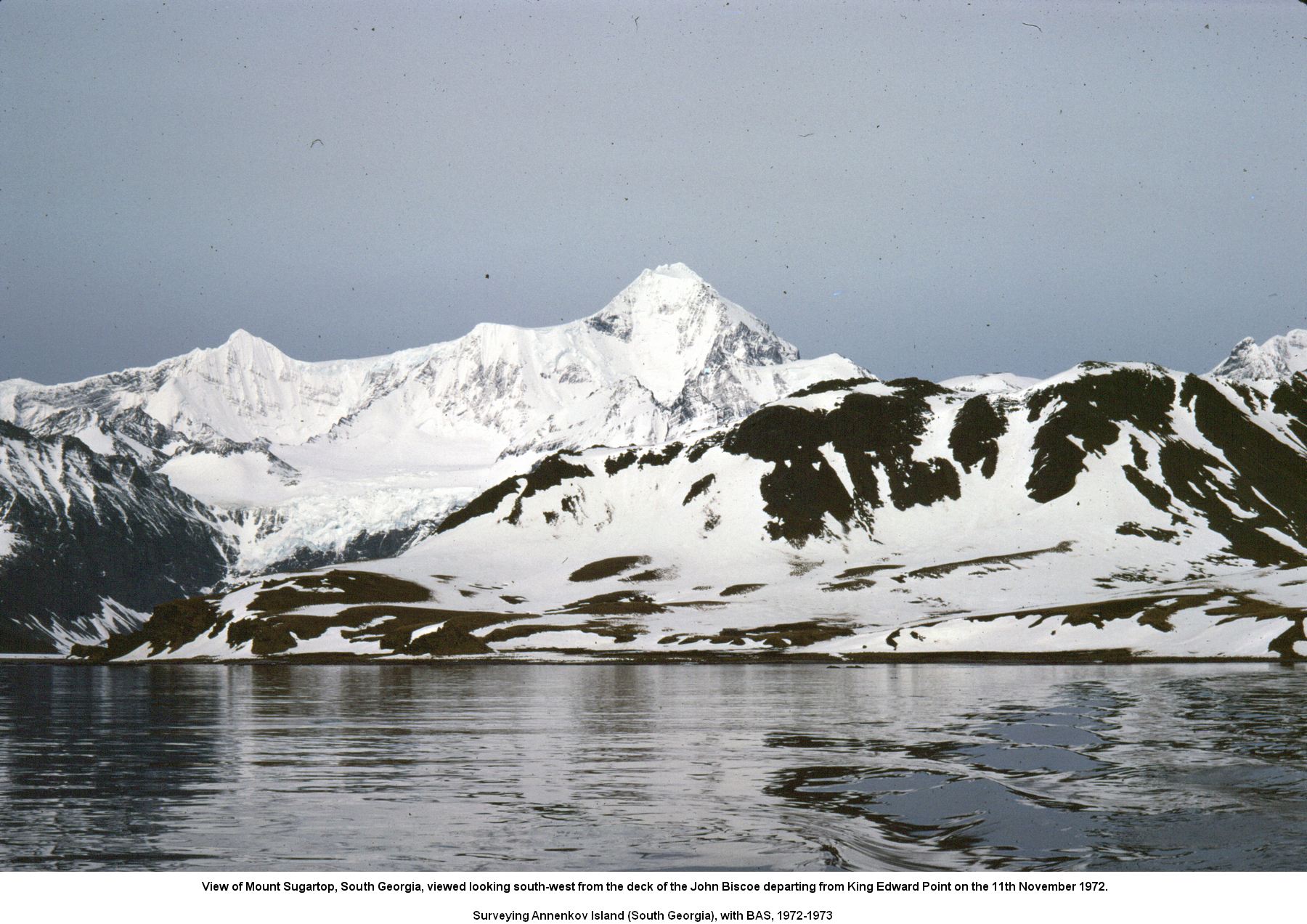 View of Mount Sugartop, South Georgia, viewed looking south-west from the deck of the John Biscoe departing from King Edward Point on the 11th November 1972.