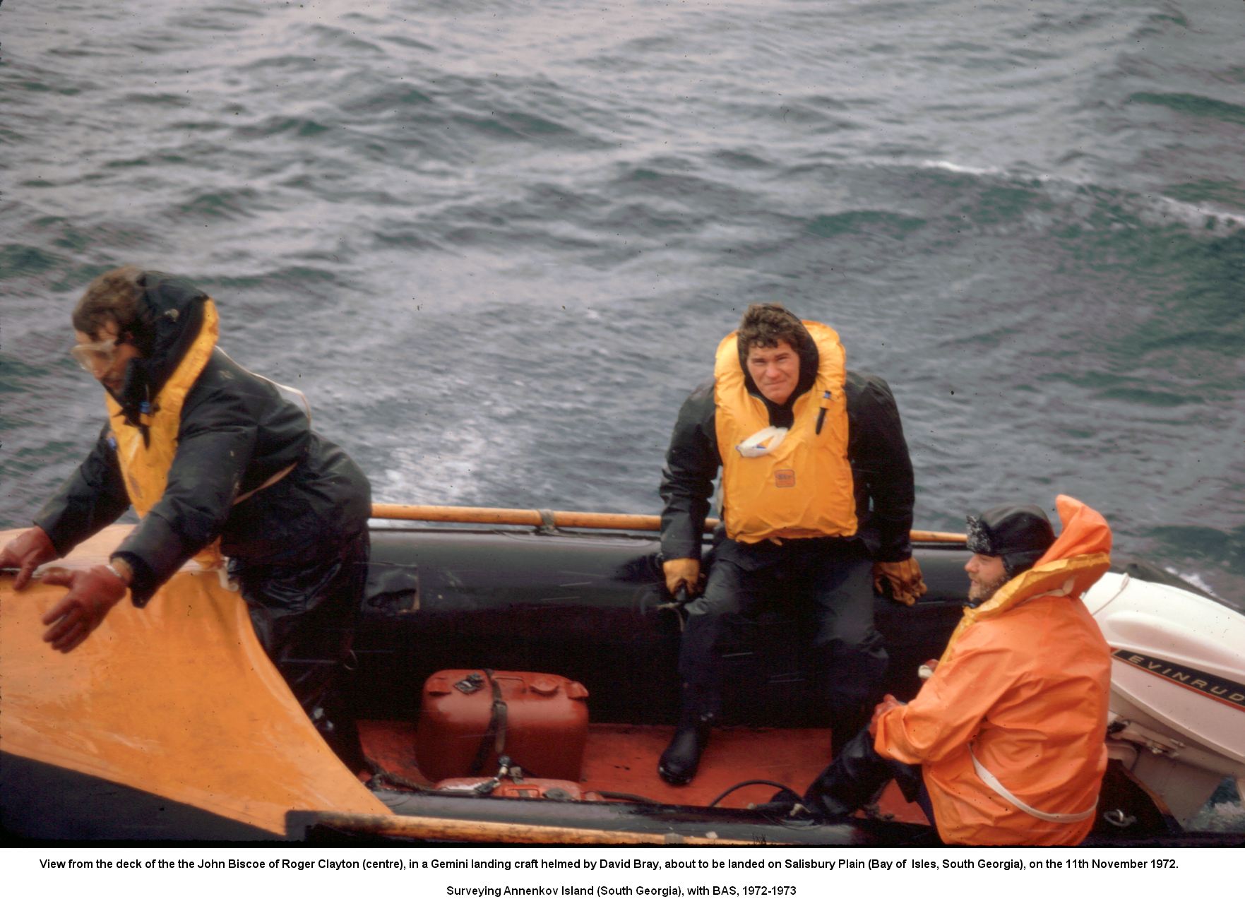 View from the deck of the the John Biscoe of Roger Clayton (centre), in a Gemini landing craft helmed by David Bray, about to be landed on Salisbury Plain (Bay of  Isles, South Georgia), on the 11th November 1972.
