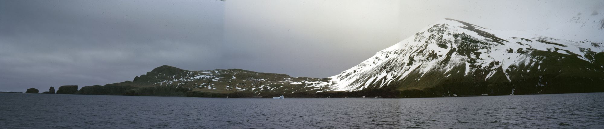 View of the north-east coast of Annenkov Island from the deck of the RRS John Biscoe, 14th November 1972.