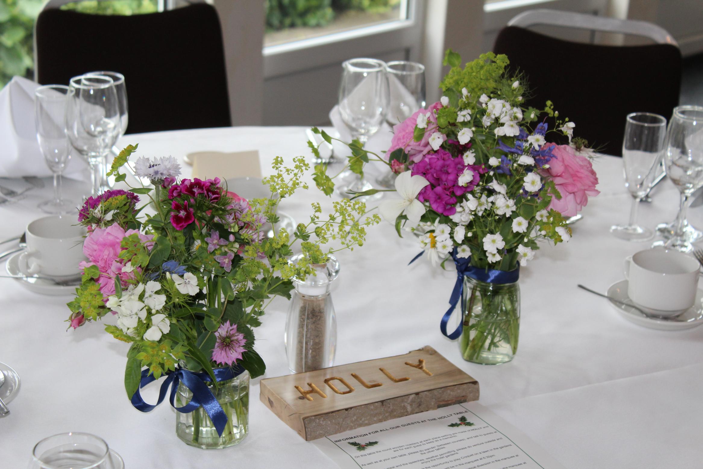 Monday morning 5th June, flowers on the Holly table set for the reception at Hunton Park Hotel.