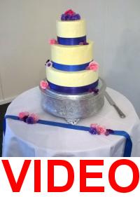 Video clip of Trish & Tim cutting their wedding cake (Video by Andy Stanton).