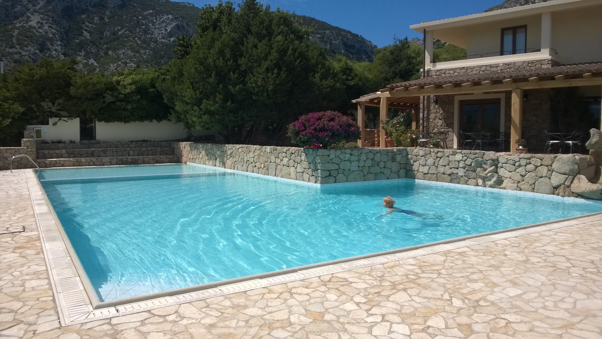 [Tuesday 7th June, swimming in the pool at the Gustui Maris Hotel, Cala Gonone, Sardinia.